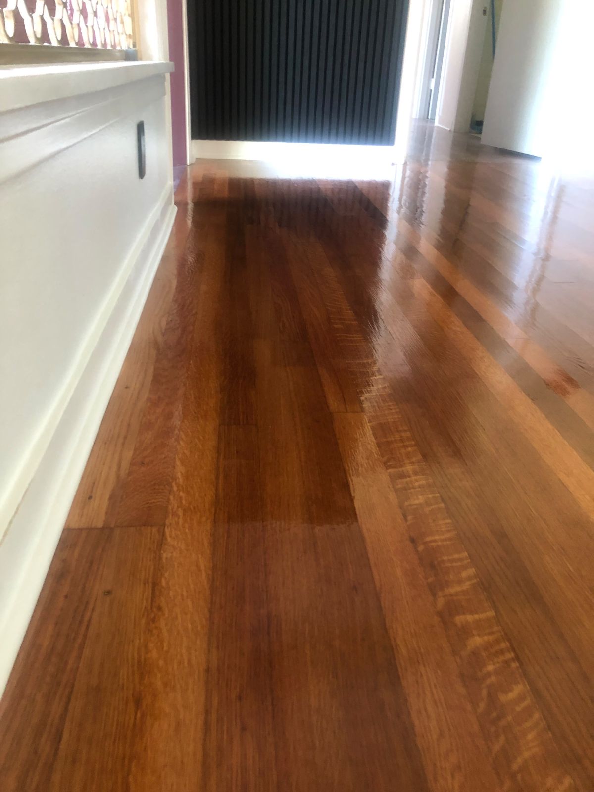 Refinished heart-pine hallway floors