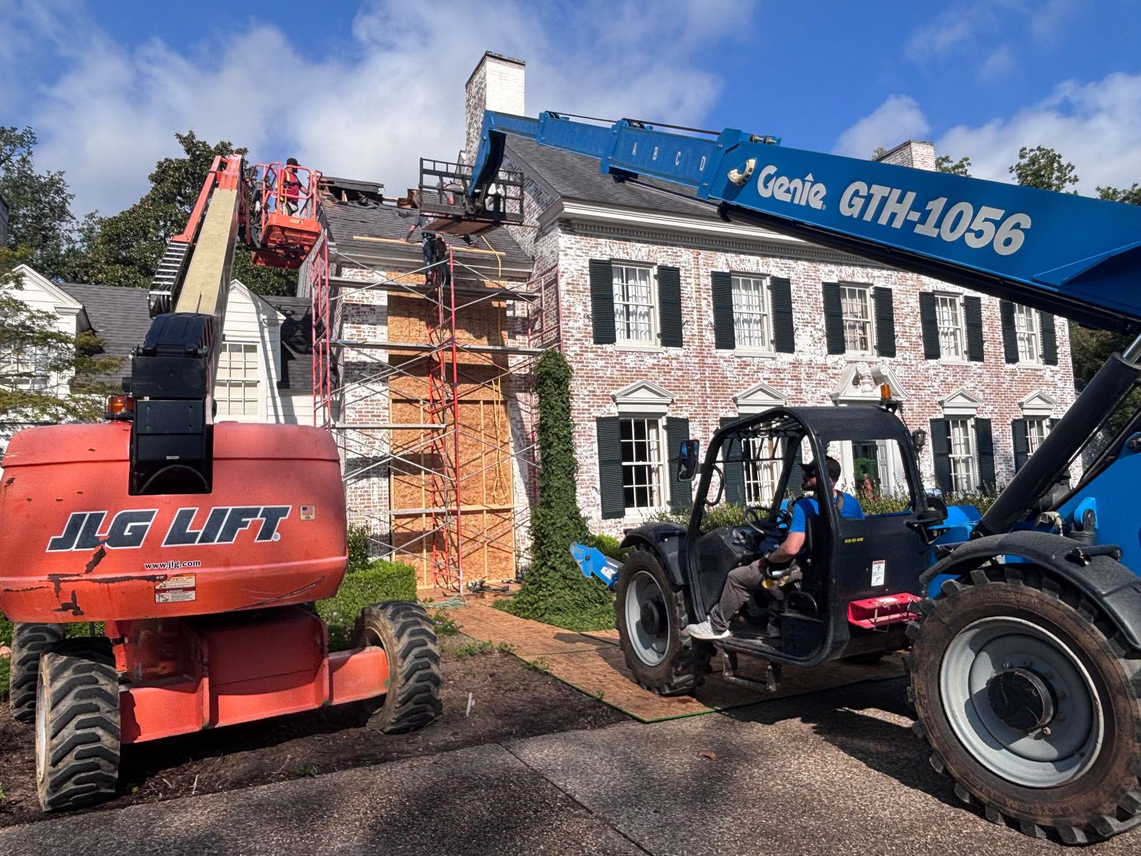 Lift and telehandler on a historic home