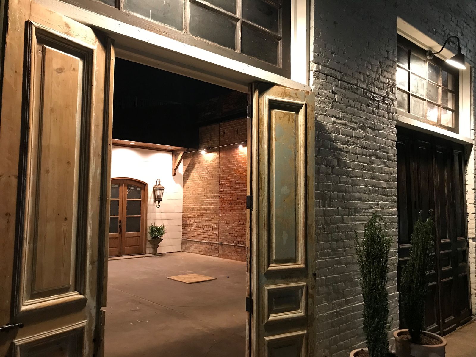 Antique doors on a brick storefront