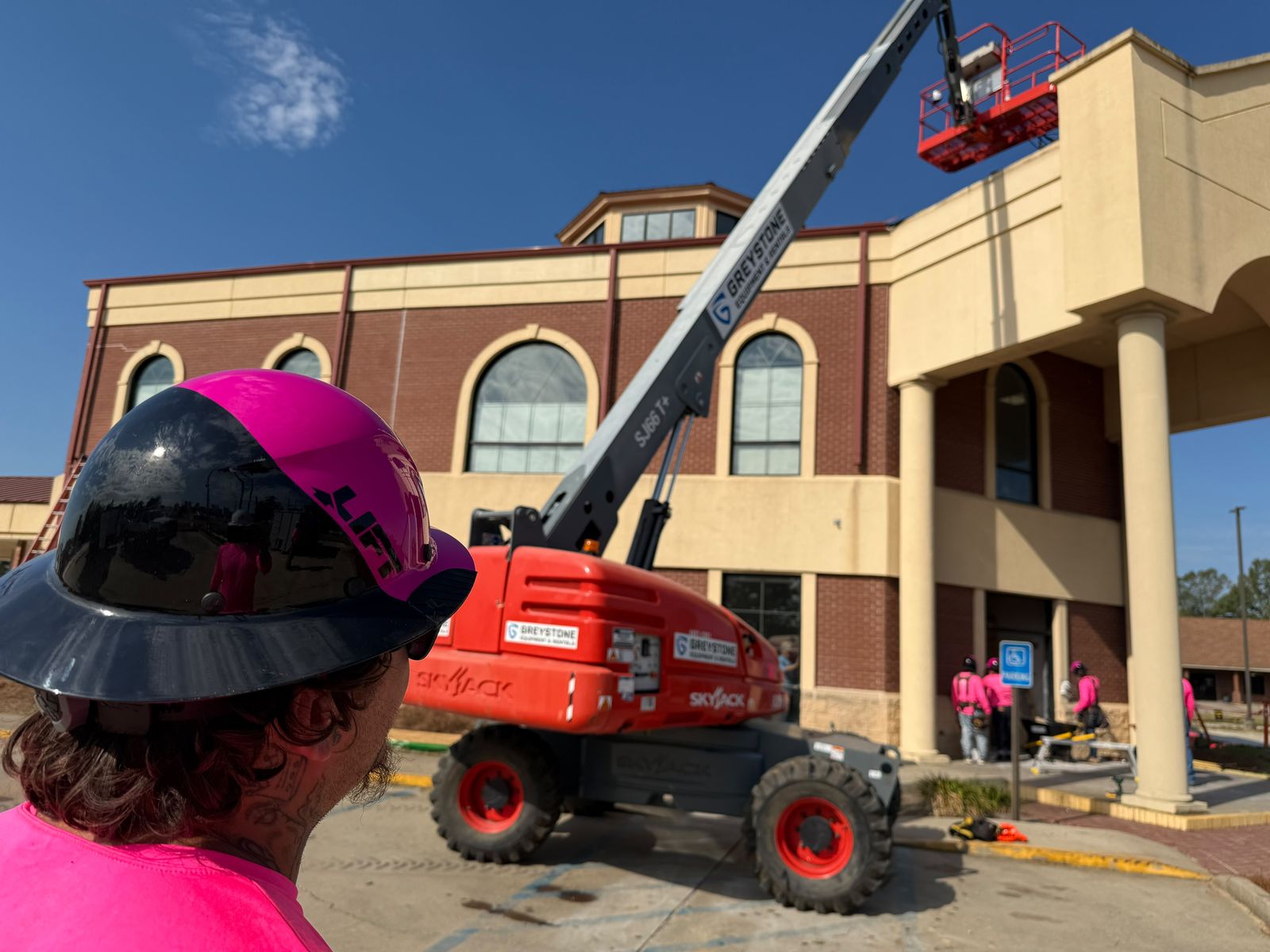 Lift work on a commercial facade