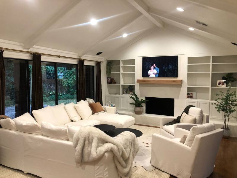 Vaulted living room with built-ins and fireplace