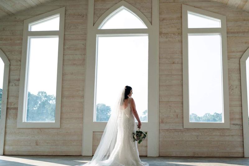 Bride in the chapel windows