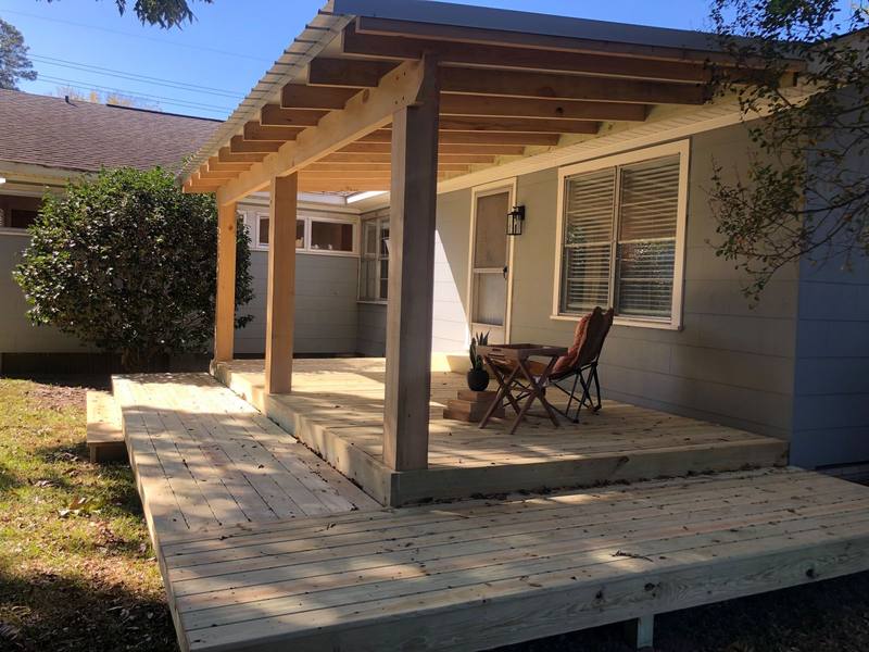 Covered deck with exposed rafters
