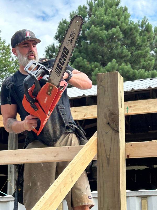 Trimming a post with the chainsaw
